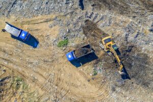 excavator and dump trucks
